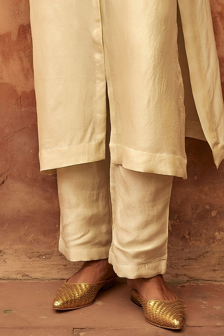 Ivory Mulberry Silk Metal Sequins Embroidered Kaftan Kurta Set by Avacara at Pernia's Pop Up Shop