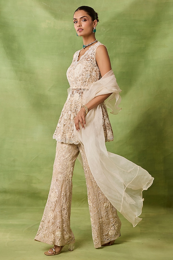 Champagne Organza & Net Embroidered Peplum Kurta Set by AWIGNA BY VARSHA & RITTU at Pernia's Pop Up Shop