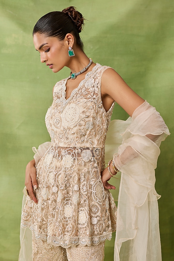 Champagne Organza & Net Embroidered Peplum Kurta Set by AWIGNA BY VARSHA & RITTU at Pernia's Pop Up Shop