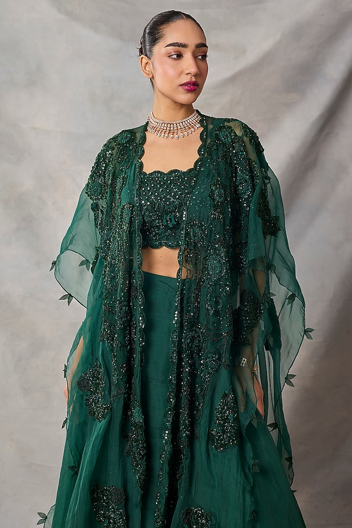 Bottle Green Organza & Net Floral Embroidered Wedding Lehenga Set by AWIGNA BY VARSHA & RITTU at Pernia's Pop Up Shop