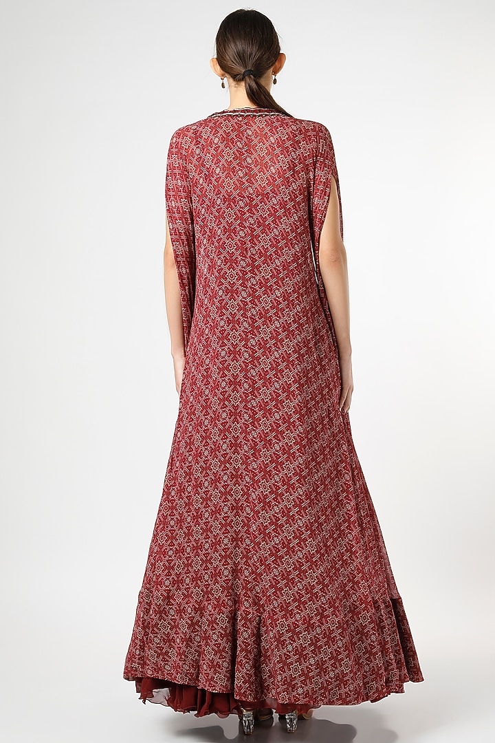 Dusky Red Embroidered Engagement Gown With Cape by AWIGNA BY VARSHA & RITTU at Pernia's Pop Up Shop