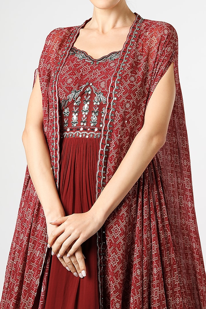 Dusky Red Embroidered Engagement Gown With Cape by AWIGNA BY VARSHA & RITTU at Pernia's Pop Up Shop