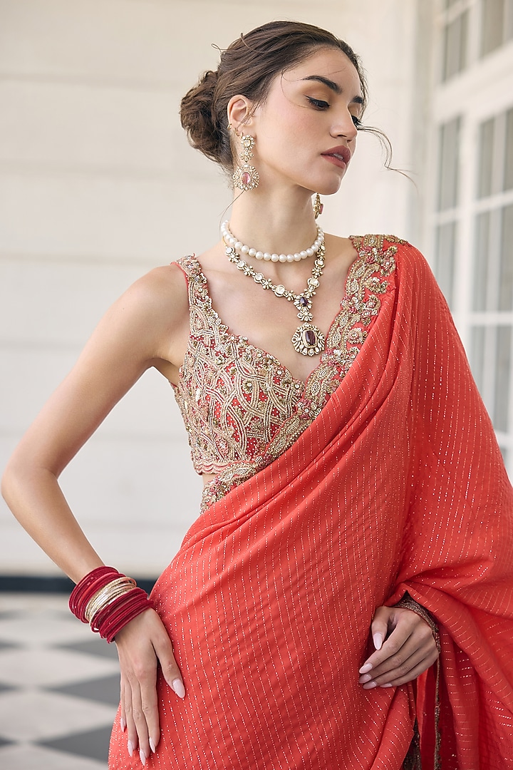 Orange Flat Chiffon Embroidered Reception Saree Set by AWIGNA BY VARSHA & RITTU at Pernia's Pop Up Shop