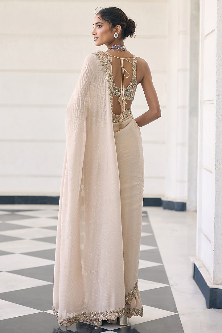 Champagne Ivory Net & Shimmer Georgette Embellished Reception Saree Set  by AWIGNA BY VARSHA & RITTU at Pernia's Pop Up Shop