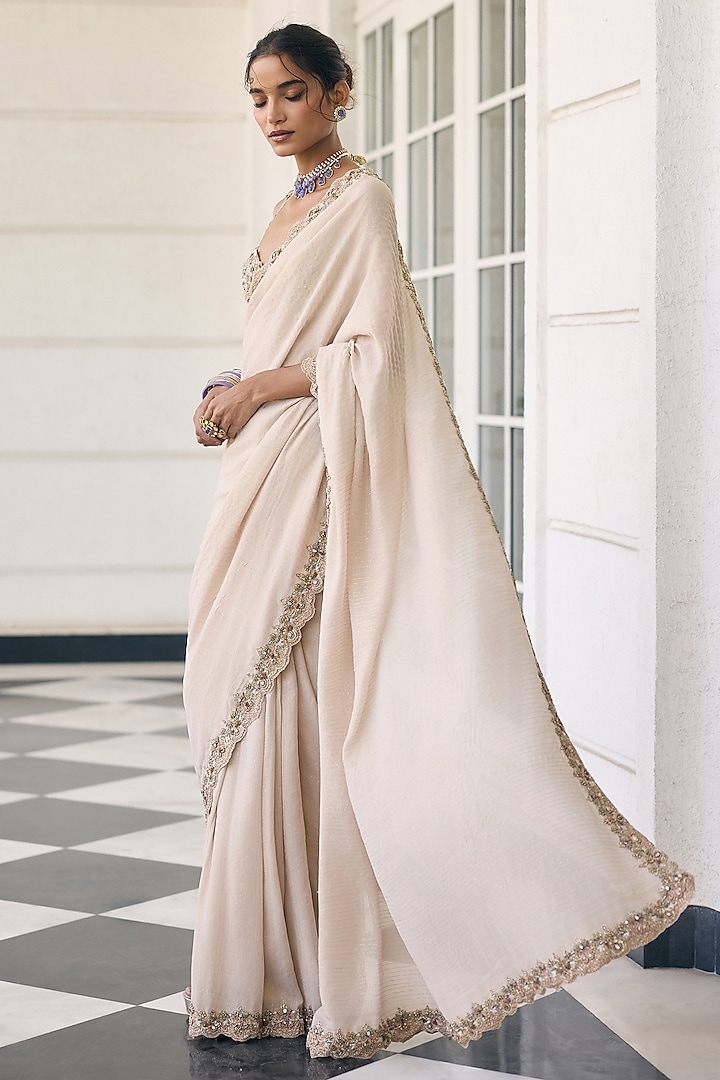 Champagne Ivory Net & Shimmer Georgette Embellished Reception Saree Set  by AWIGNA BY VARSHA & RITTU at Pernia's Pop Up Shop