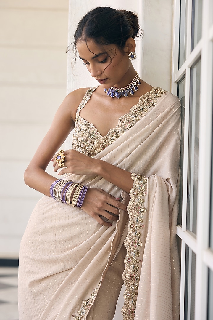 Champagne Ivory Net & Shimmer Georgette Embellished Reception Saree Set  by AWIGNA BY VARSHA & RITTU at Pernia's Pop Up Shop