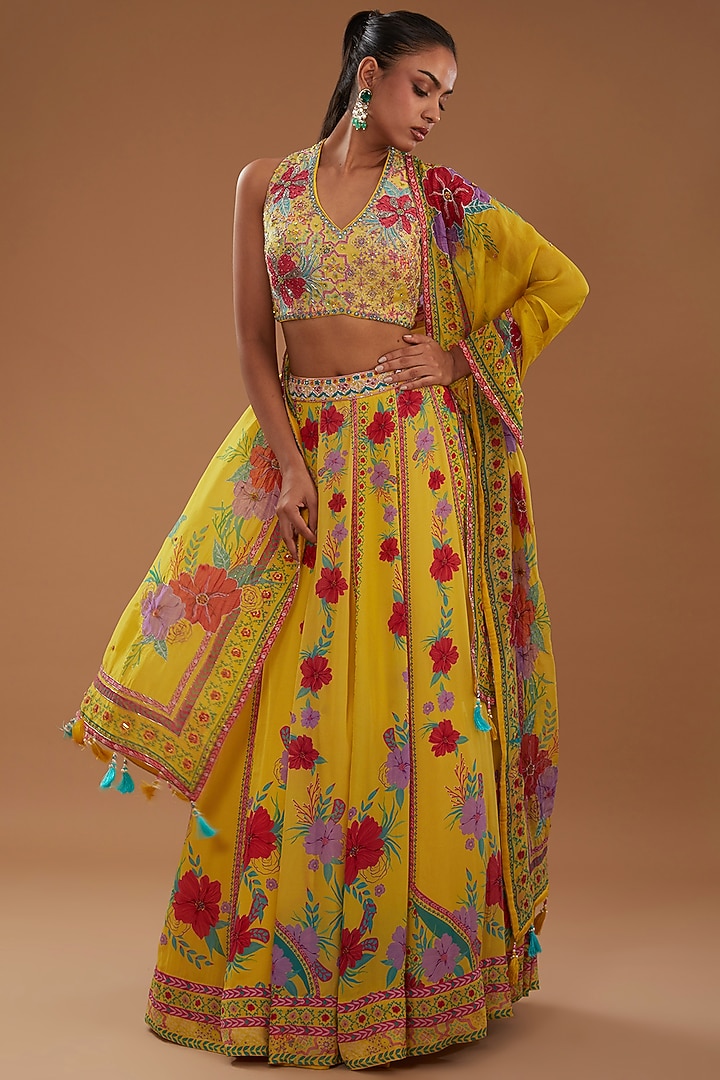 Yellow Crepe Floral Printed Wedding Lehenga Set by AWIGNA BY VARSHA & RITTU at Pernia's Pop Up Shop