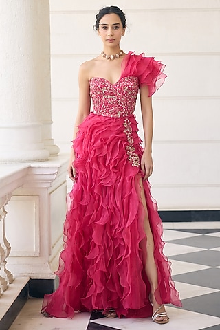 pleated indian dress That is a striking piece! It looks like a contemporary take on traditional Indian wear, likely a pleated Indo-western midi dress featuring a structured corset-style bodice with a modern twist. The