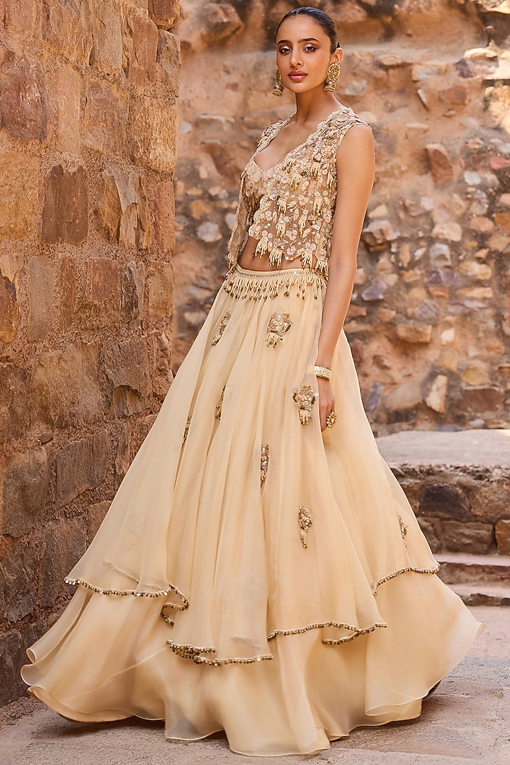 Champagne Organza Layered Wedding Lehenga Set by AWIGNA BY VARSHA & RITTU at Pernia's Pop Up Shop