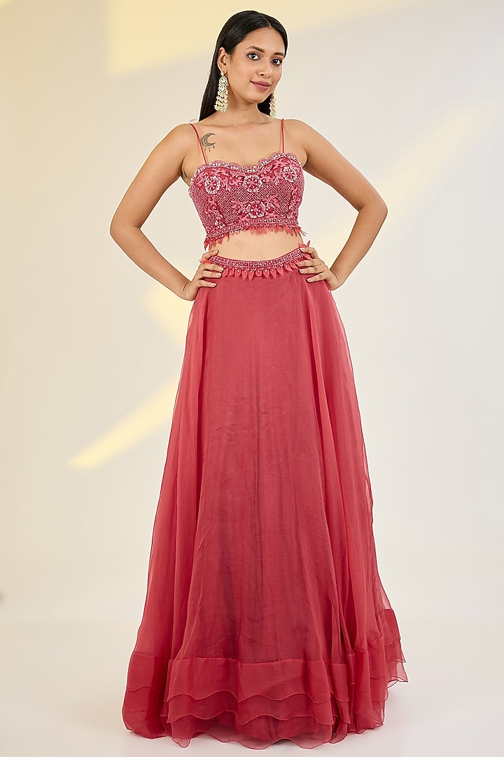 Coral Red Organza & Net Floral Embroidered Jacket Wedding Lehenga Set by AWIGNA BY VARSHA & RITTU at Pernia's Pop Up Shop