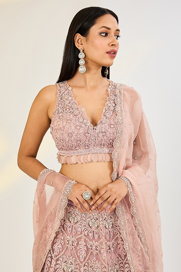 Rose Pink Net & Organza Hand Embroidered Wedding Lehenga Set by AWIGNA BY VARSHA & RITTU at Pernia's Pop Up Shop