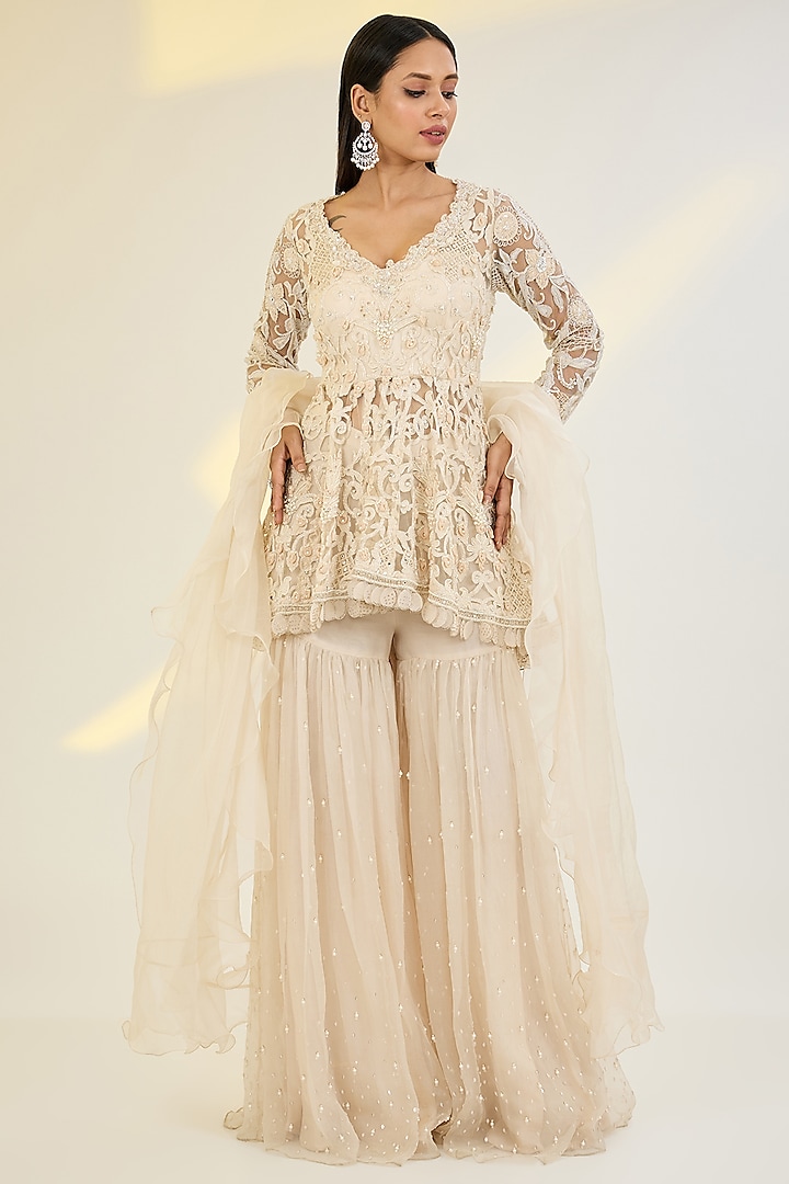 Ivory Net & Organza Sharara Set by AWIGNA BY VARSHA & RITTU at Pernia's Pop Up Shop