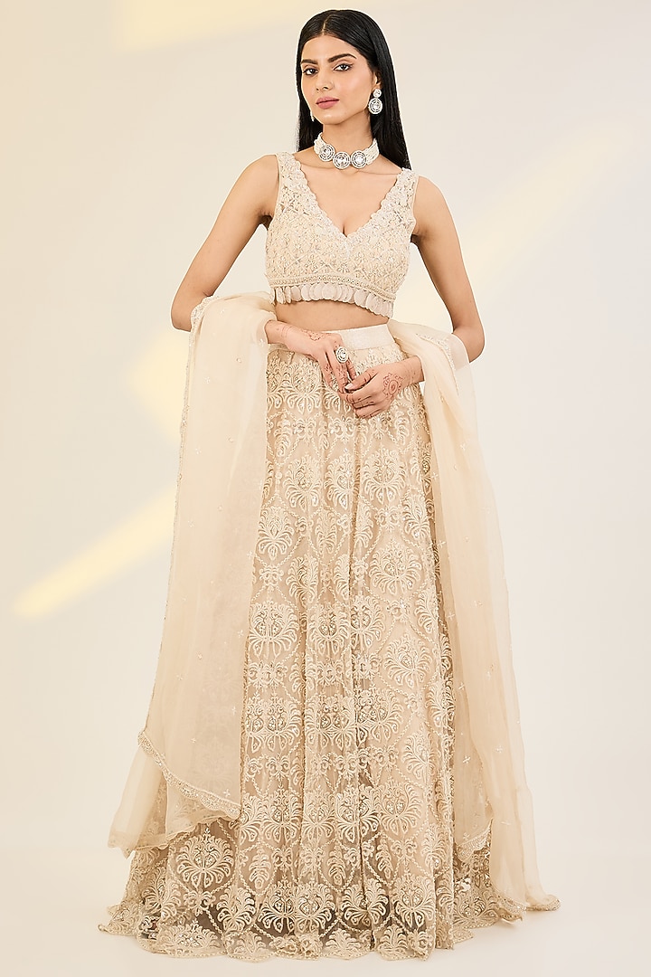 Ivory Net & Organza Hand Embroidered Wedding Lehenga Set by AWIGNA BY VARSHA & RITTU at Pernia's Pop Up Shop