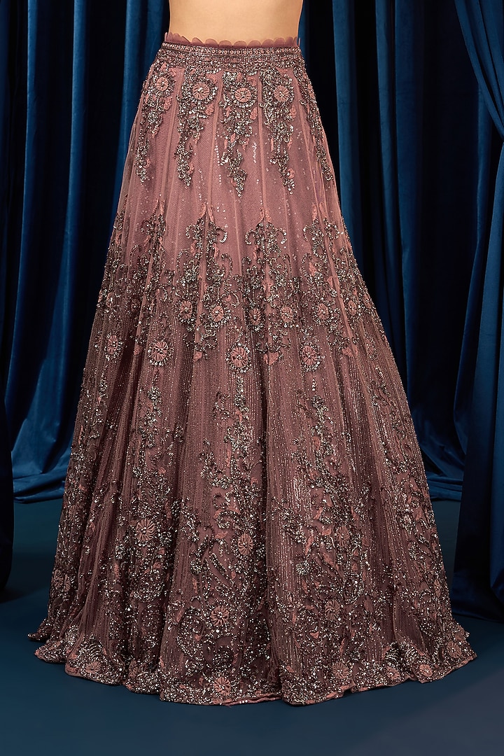 Dusty Onion Pink Net Floral Motifs Embroidered Wedding Lehenga Set by AWIGNA BY VARSHA & RITTU at Pernia's Pop Up Shop