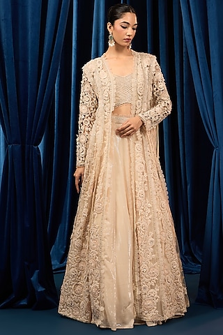 Ivory Net Floral Embroidered Jacket Set by AWIGNA BY VARSHA & RITTU