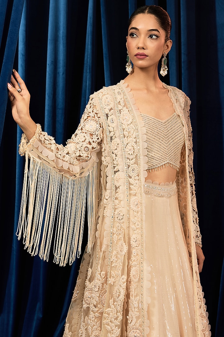 Ivory Net Floral Embroidered Jacket Set by AWIGNA BY VARSHA & RITTU at Pernia's Pop Up Shop