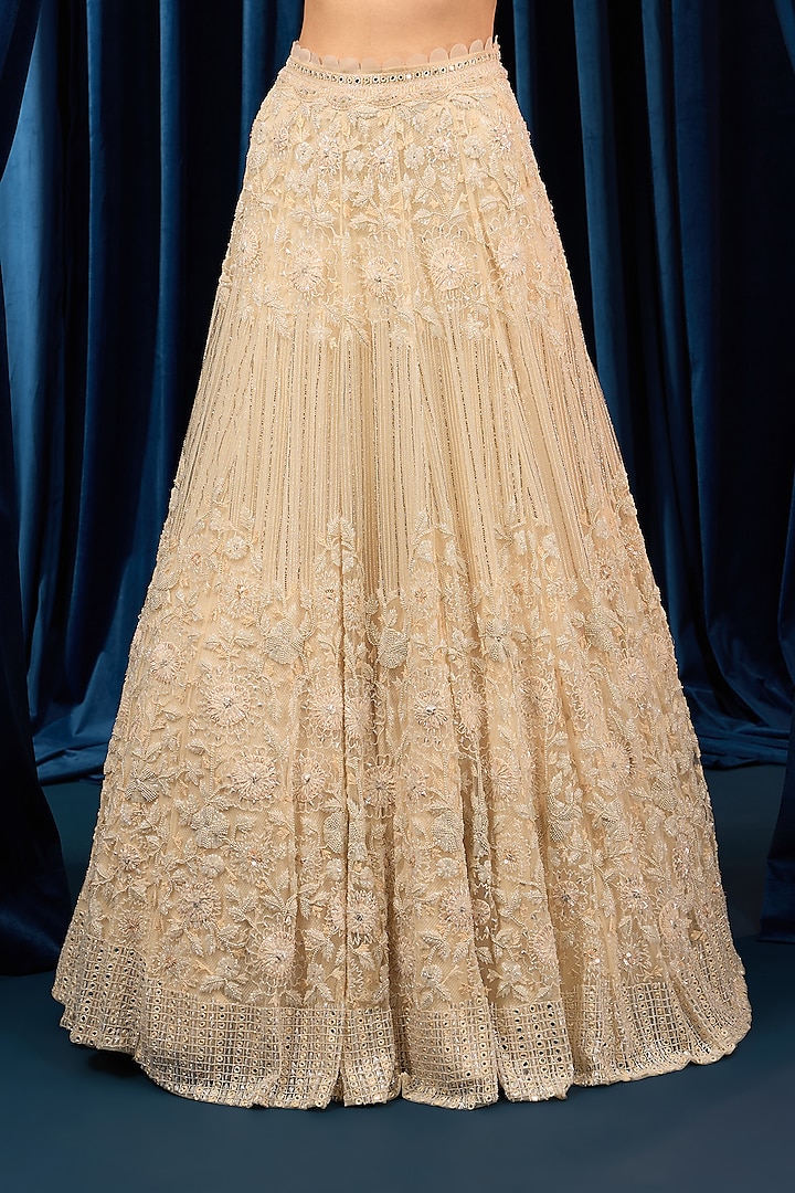 Ivory Net Floral Embroidered Bridal Lehenga Set by AWIGNA BY VARSHA & RITTU at Pernia's Pop Up Shop