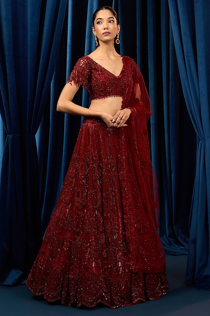 Red Net 3D Floral Embroidered Bridal Lehenga Set by AWIGNA BY VARSHA & RITTU at Pernia's Pop Up Shop