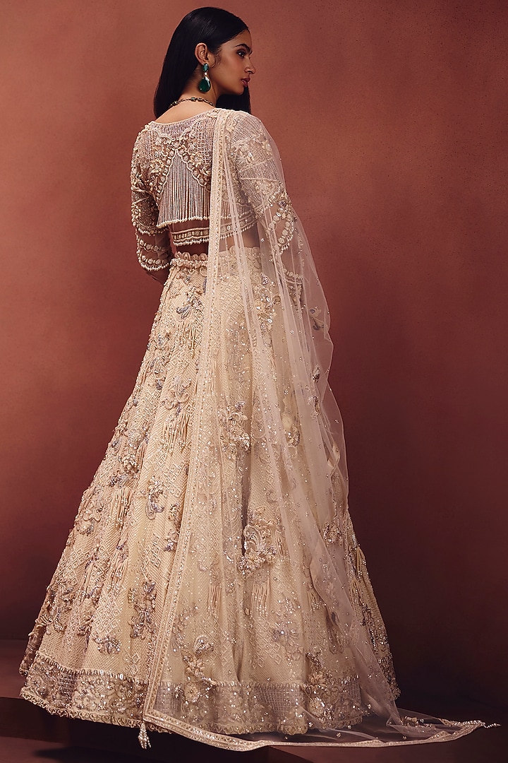 Ivory Net Embroidered Bridal Lehenga Set by AWIGNA BY VARSHA & RITTU at Pernia's Pop Up Shop