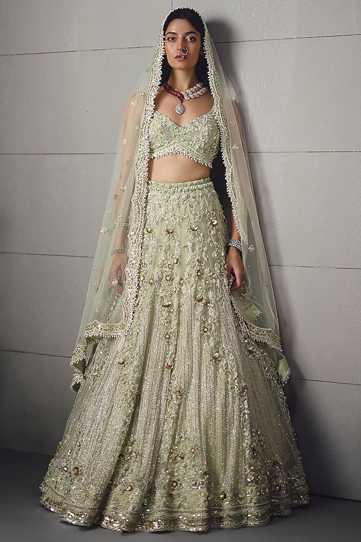Sage Green Net Embroidered Bridal Lehenga Set by AWIGNA BY VARSHA & RITTU at Pernia's Pop Up Shop