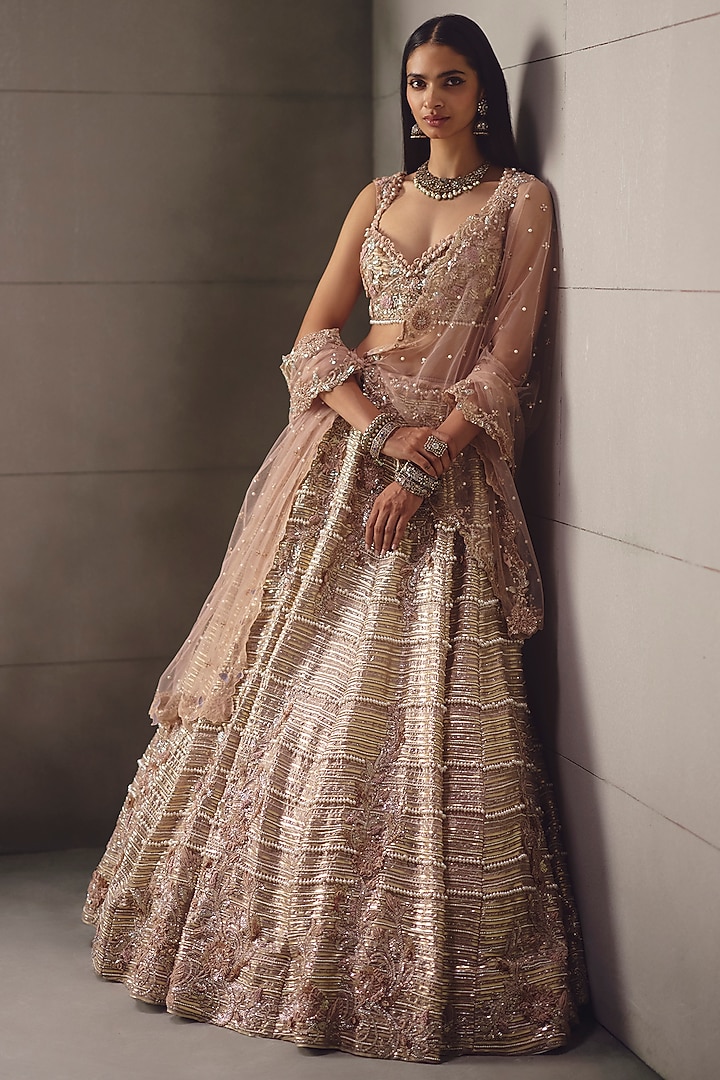 Dusty Pink Shimmer Georgette & Net Embroidered Bridal Lehenga Set by AWIGNA BY VARSHA & RITTU at Pernia's Pop Up Shop