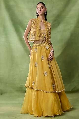 Yellow Organza Net Ruffled Layered Skirt Set by AWIGNA BY VARSHA & RITTU