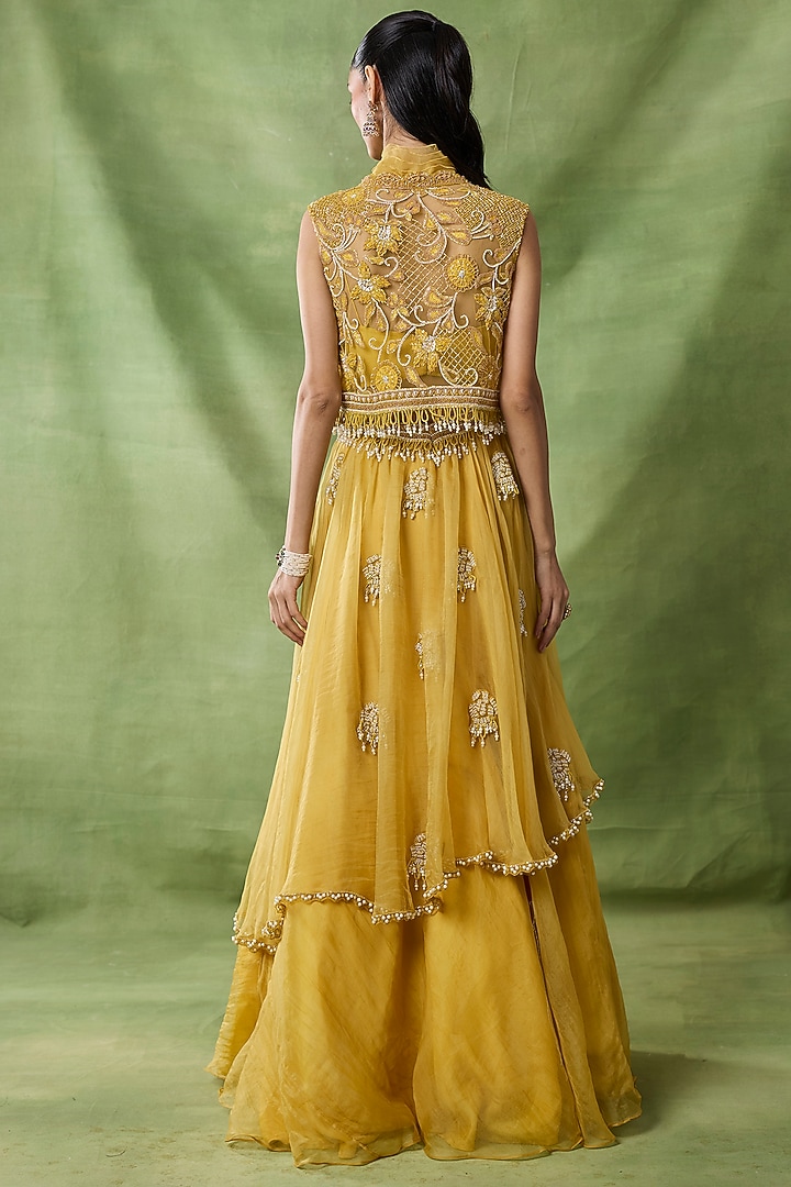 Yellow Organza Net Ruffled Layered Skirt Set by AWIGNA BY VARSHA & RITTU at Pernia's Pop Up Shop