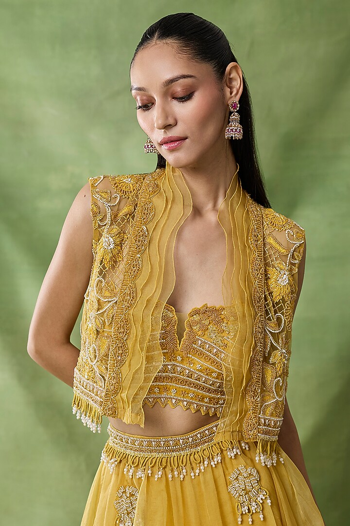 Yellow Organza Net Ruffled Layered Skirt Set by AWIGNA BY VARSHA & RITTU at Pernia's Pop Up Shop