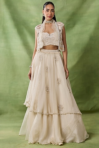 Ivory Organza Net Ruffled Layered Skirt Set by AWIGNA BY VARSHA & RITTU