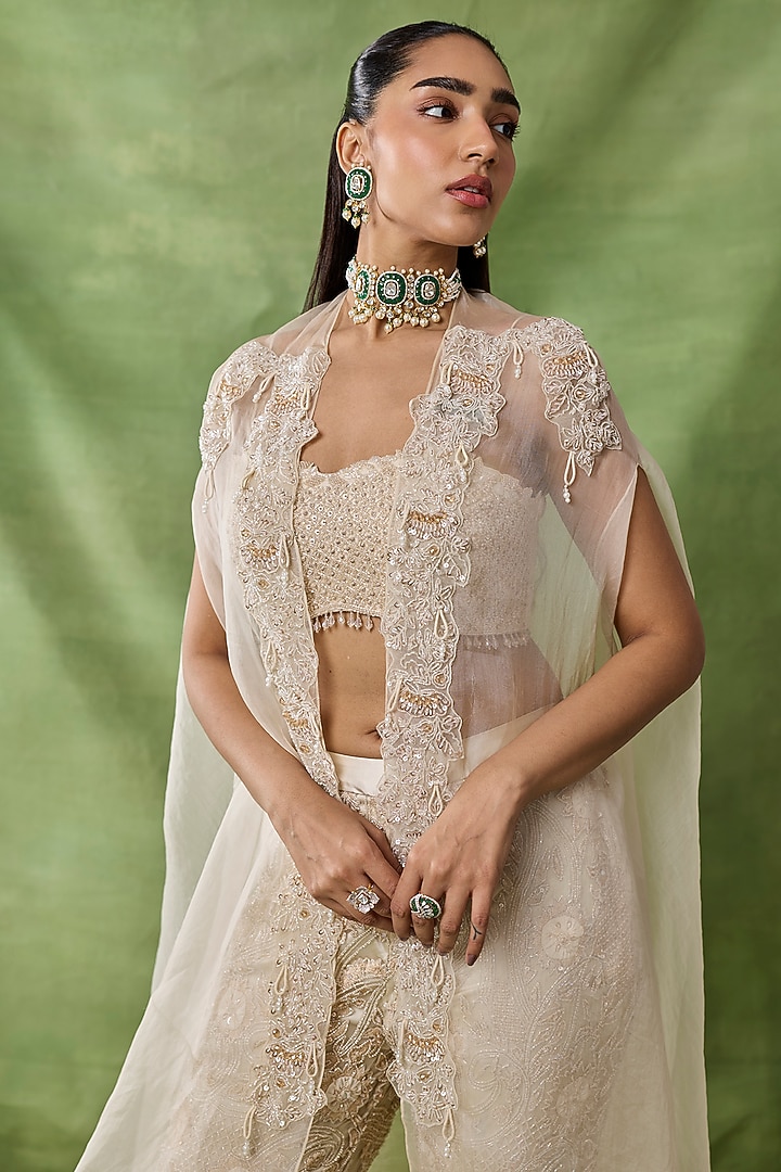 Ivory Organza Net Floral Embroidered Pant Set by AWIGNA BY VARSHA & RITTU at Pernia's Pop Up Shop