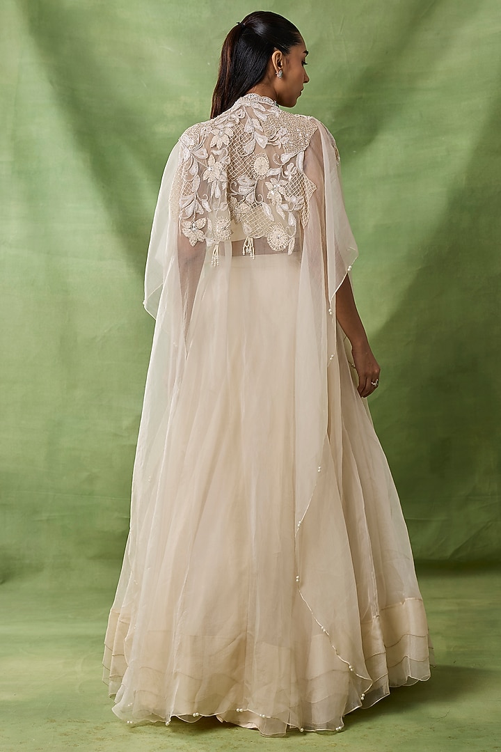 Ivory Organza Net Flared Skirt Set by AWIGNA BY VARSHA & RITTU at Pernia's Pop Up Shop