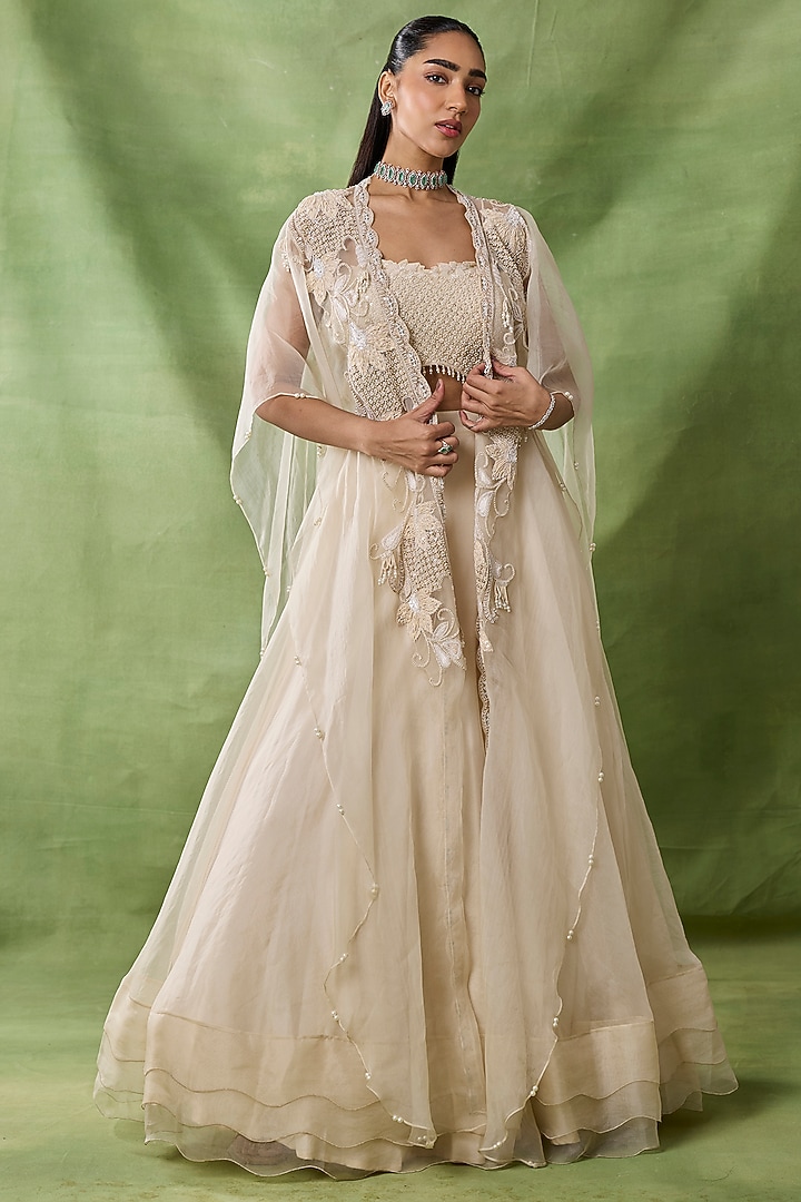 Ivory Organza Net Flared Skirt Set by AWIGNA BY VARSHA & RITTU at Pernia's Pop Up Shop