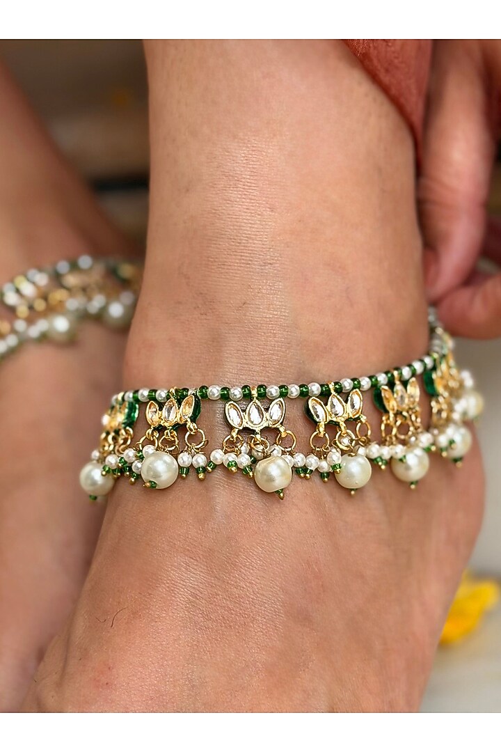 Gold Finish Green Kundan Polki Anklets (Set Of 2) by AVSA Jewels at Pernia's Pop Up Shop