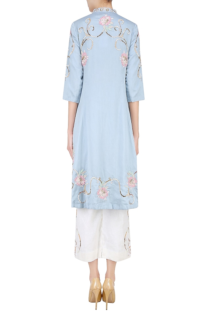 Powder blue 3D embroidered roses tunic with off white pants available only at Pernia's Pop Up Shop.