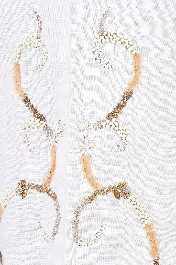 Powder blue 3D embroidered roses tunic with off white pants available only at Pernia's Pop Up Shop.