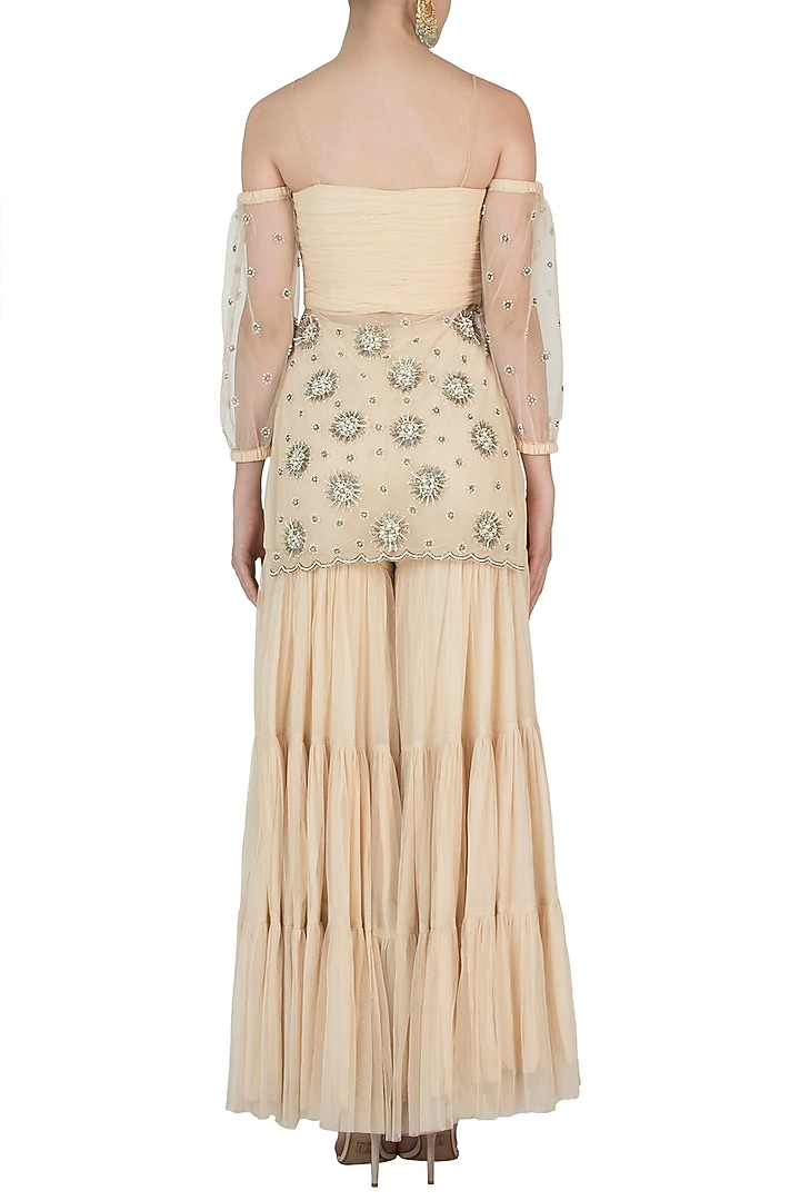 Off white embroidered kurta with sharara pants available only at Pernia's Pop Up Shop.