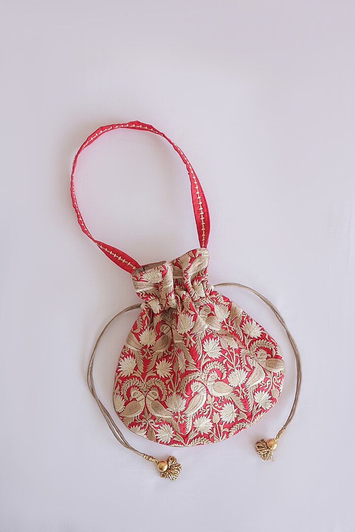 Red Raw Silk Hand Block Printed & Tassels Embroidered Potli Bag by ADYA Jaipur at Pernia's Pop Up Shop