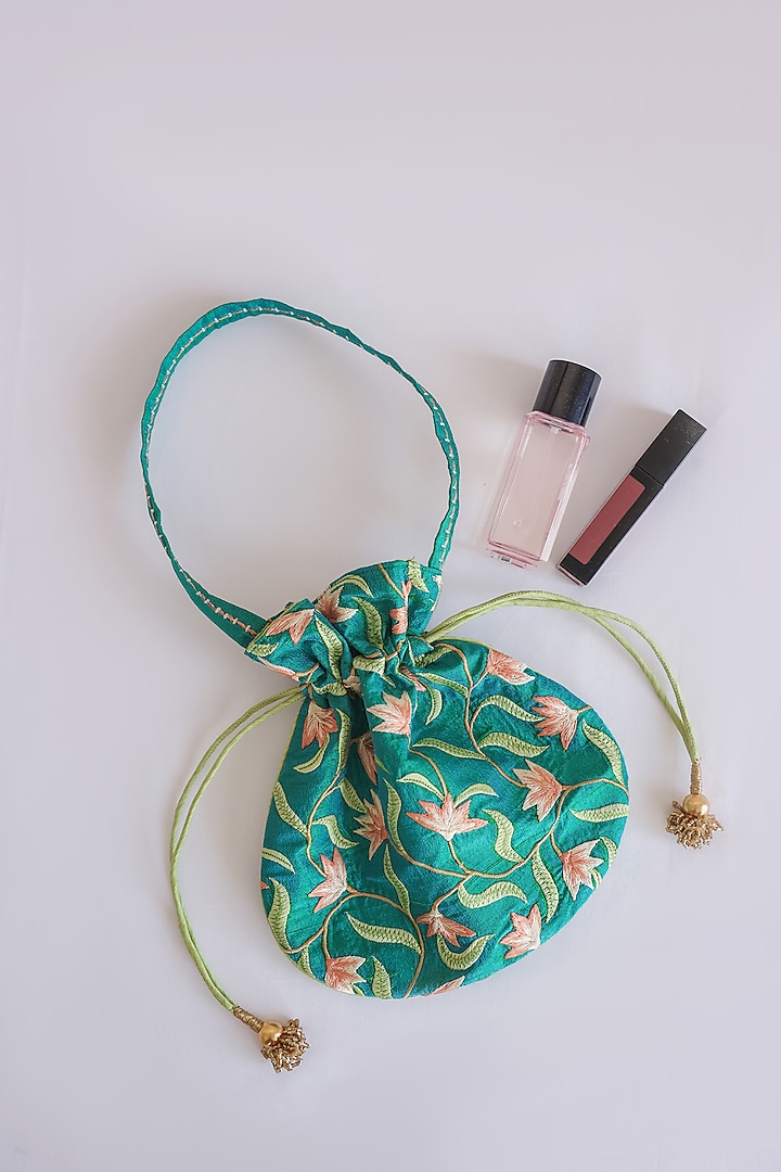 Green Raw Silk Floral Embroidered & Hand Block Printed Potli Bag by ADYA Jaipur
