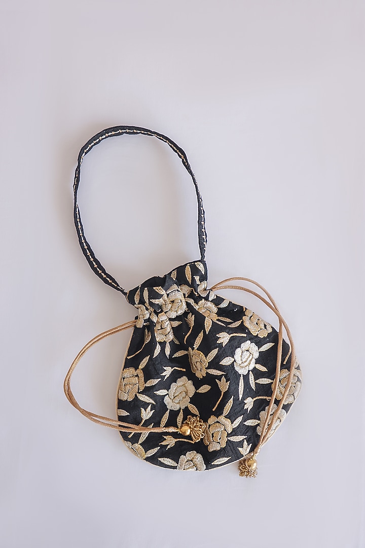 Black Raw Silk Floral Embroidered & Hand Block Printed Potli Bag by ADYA Jaipur at Pernia's Pop Up Shop
