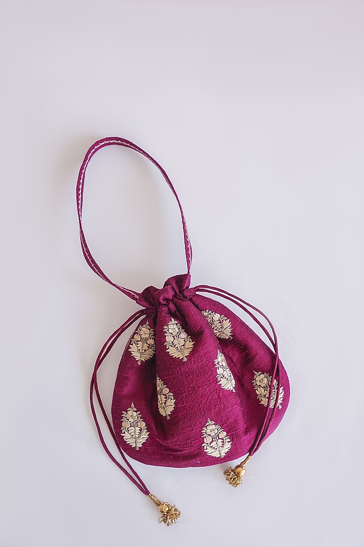 Maroon Raw Silk Floral Embroidered & Hand Block Printed Potli Bag by ADYA Jaipur at Pernia's Pop Up Shop