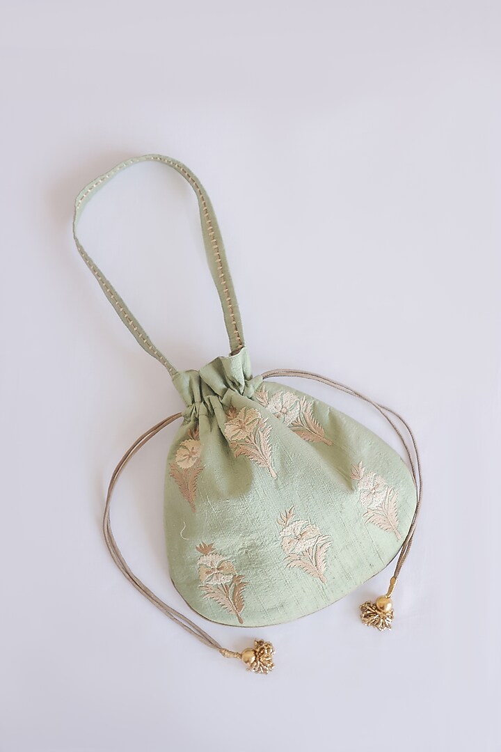 Green Raw Silk Floral Embroidered & Hand Block Printed Potli Bag by ADYA Jaipur at Pernia's Pop Up Shop