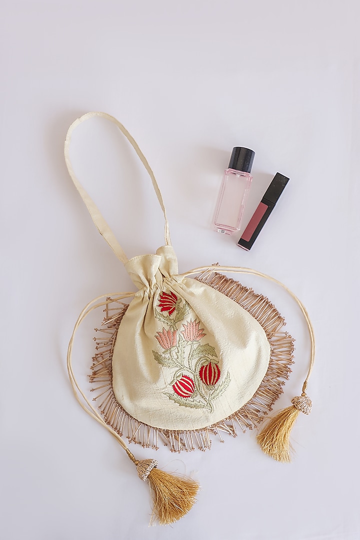 Beige Raw Silk Floral Embroidered & Hand Block Printed Potli Bag by ADYA Jaipur