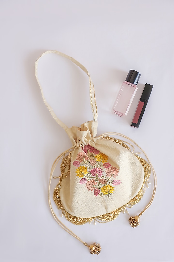 Beige Raw Silk Floral Embroidered & Hand Block Printed Potli Bag by ADYA Jaipur