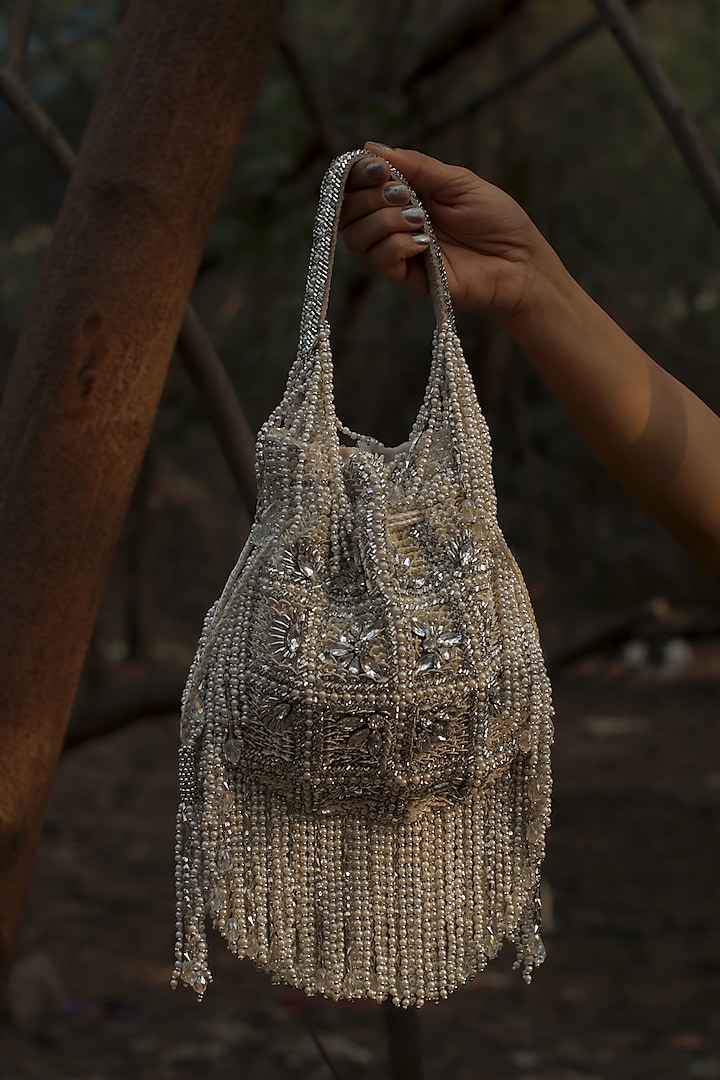 Ivory Silk Velvet 3D Floral Sequins Hand Embroidered Potli Bag by AYE VI at Pernia's Pop Up Shop