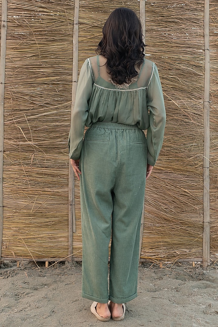 Green Corduroy Pleated Trousers by AYAKA at Pernia's Pop Up Shop