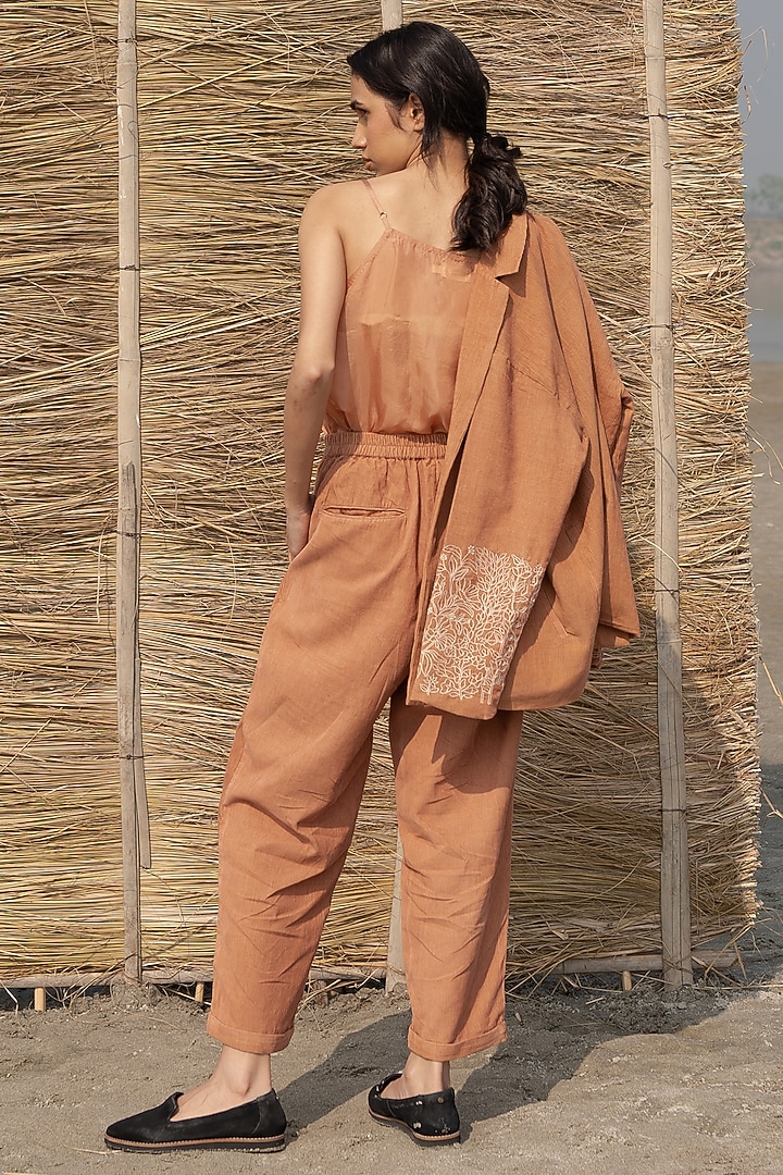 Brown Corduroy Pleated Trousers by AYAKA at Pernia's Pop Up Shop