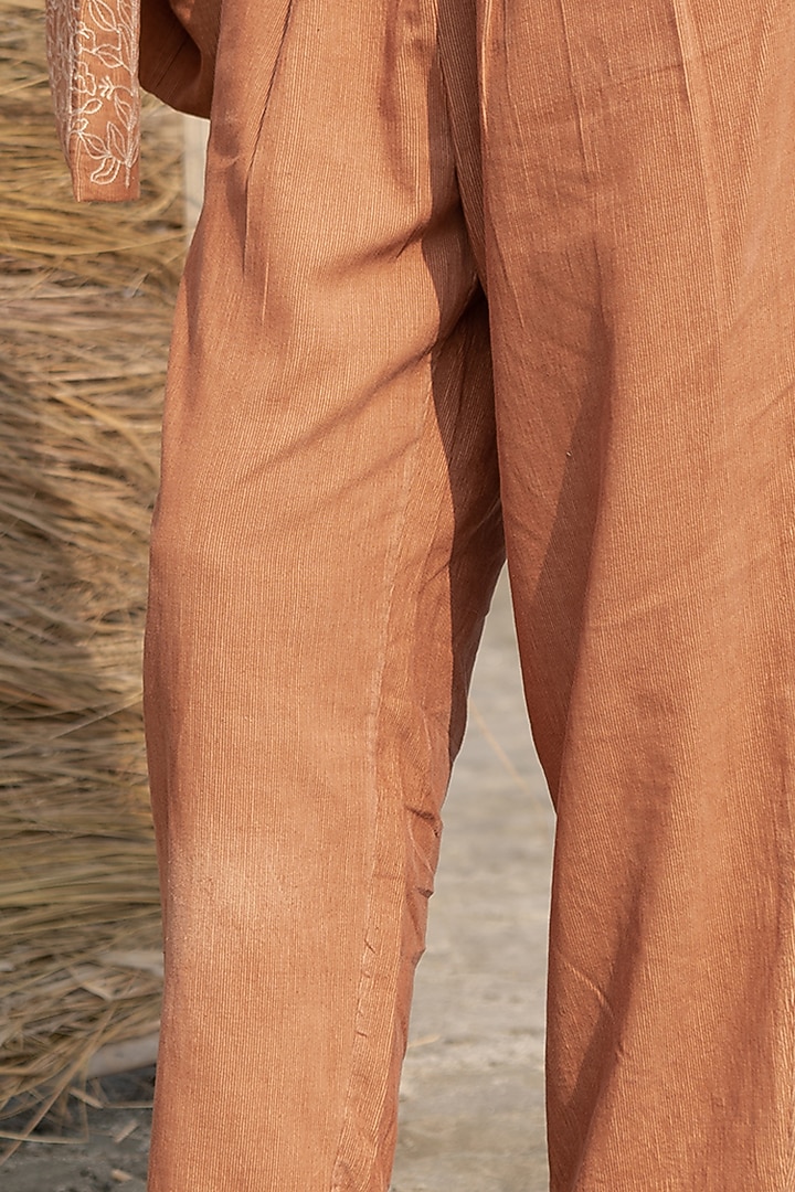 Brown Corduroy Pleated Trousers by AYAKA at Pernia's Pop Up Shop