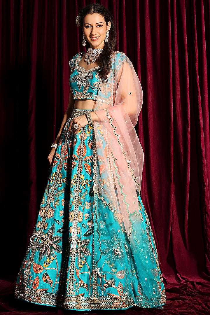 Fluorescent Turquoise Hand Embroidered Lehenga Set by Aayushi Maniar