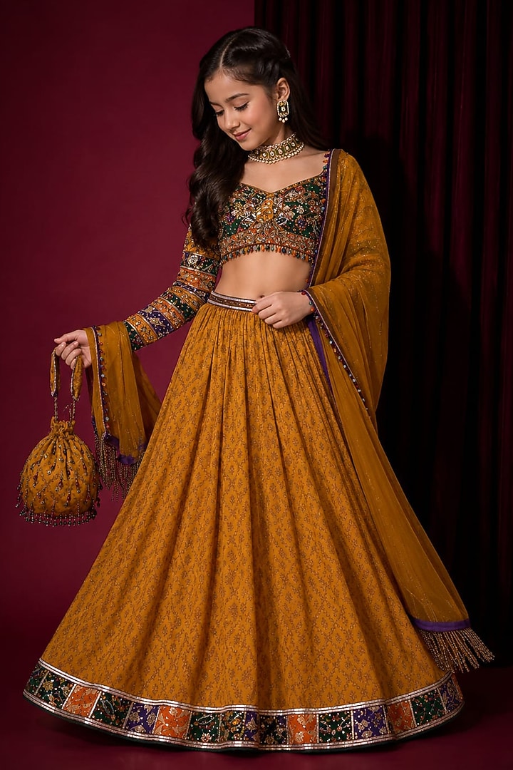 Mustard Yellow Tussar Silk Hand Embroidered Lehenga Set For Girls by Aayushi Maniar Kids at Pernia's Pop Up Shop