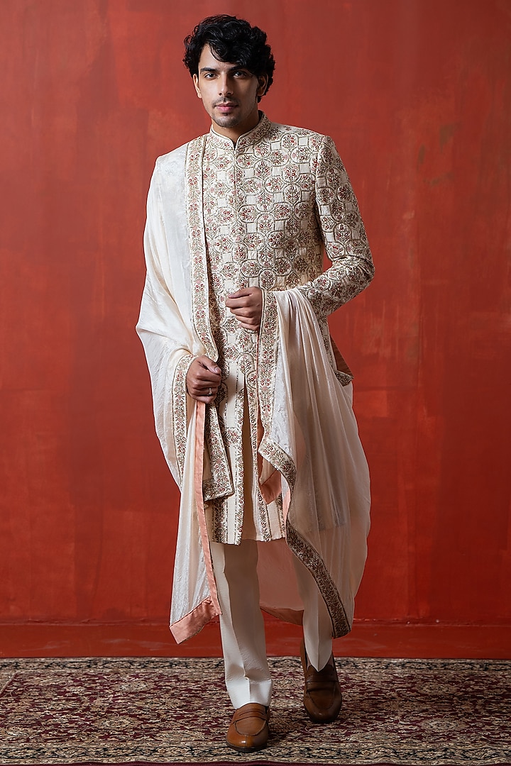 Light Peach Cotton Silk & Raw Silk Floral Embroidered Sherwani Set by AYUSH JAIN